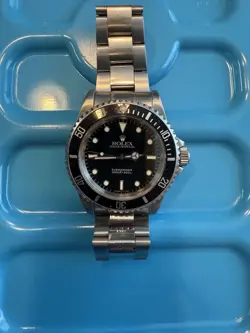 ROLEX SUBMARINER 14060 SILVER OYSTER BRACELET WITH BLACK BEZEL