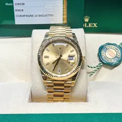 ROLEX 228238 DAY-DATE 40MM YELLOW GOLD CHAMPAGNE BAGUETTE DIAMOND-SET PRESIDENT
