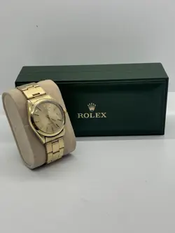 VINTAGE GOLD SHELL ROLEX OYSTER PERPETUAL REF. 1024 CHAMPAGNE DIAL