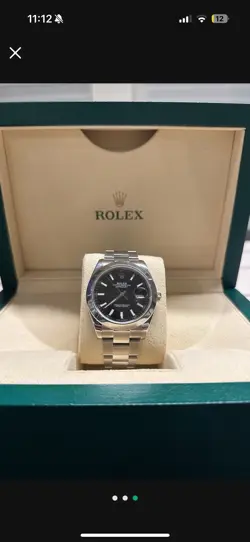 ROLEX 41MM DATE JUST BLACK DIAL. MINT CONDITION. COMES WITH BOX AND APPRAISAL