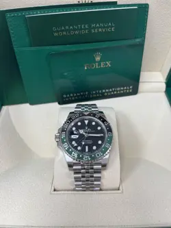 ROLEX GMT-MASTER II 126720VTNR SILVER JUBILEE BRACELET BLACK AND GREEN BEZEL