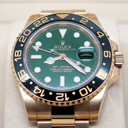 WITH GREEN DIAL