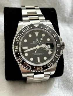 2012 ROLEX GMT-MASTER II 116710LN SILVER OYSTER BRACELET WITH BLACK BEZEL