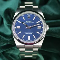 ROLEX OYSTER PERPETUAL BLUE DIAL STAINLESS STEEL MINT COMPLETE SET 124300