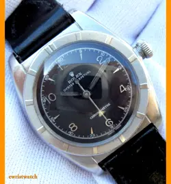 VINTAGE ROLEX OYSTER PERPETUAL CHRONOMETER BLACK DIAL ENGINE BEZEL SS BUBBLEBACK
