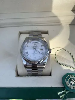 ROLEX DAY-DATE 40MM WHITE GOLD WHITE ROMAN DIAL PRESIDENTIAL BRACELET 228239