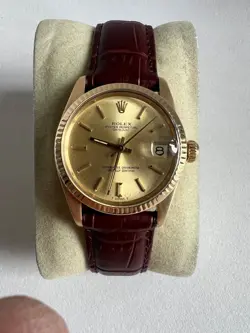 31 MM ROLEX OYSTER PERPETUAL DATE 18 K GOLD WATCH CAL.2030 REF.6827