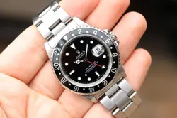 VINTAGE 1990 ROLEX GMT-MASTER REF. 16700 “ALL-BLACK BEZEL”