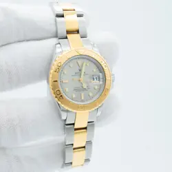 ROLEX - LADIES 18KT GOLD STAINLESS YACHTMASTER SILVER DIAL - 169623
