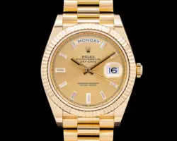 ROLEX 228238 DAY DATE PRESIDENT 18K YELLOW GOLD CHAMPAGNE BAGUETTE DIAL