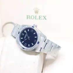 ROLEX 31MM BLACK INDEXES OYSTER PERPETUAL REF: 67480 (T SERIES)