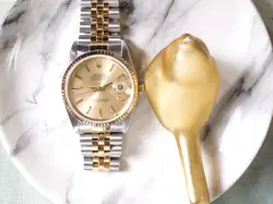 AND STEEL AUTOMATIC