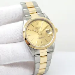 ROLEX 15203 OYSTER PERPETUAL DATE 18K/SS WITH CHAMPAGNE STICK DIAL