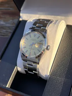 1967 ROLEX OYSTER PERPETUAL DATE 1500 CALIBRE 1570 GOLD MOSAIC DIAL