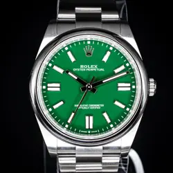 ROLEX OYSTER PERPETUAL 41MM GREEN DIAL – REF. 124300 WITH BOX & PAPERS