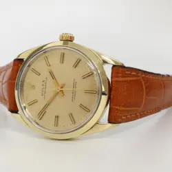 ROLEX OYSTER PERPETUAL 34MM GOLD SHELL AUTOMATIC CHAMPAGNE DIAL 1024