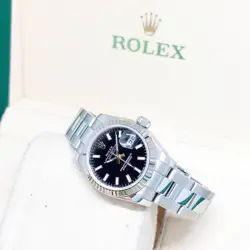 ROLEX 26MM OYSTER PERPETUAL BLACK BATONS DIAL LADY DATEJUST REF: 179174 (2014)