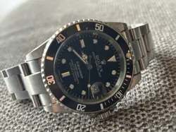 ROLEX SUBMARINER 168000 SILVER OYSTER BRACELET WITH BLACK BEZEL.  NAKED