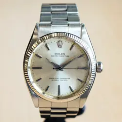 1960 ROLEX OYSTER PERPETUAL 34MM REF. 1005 S.S. FLUTED BEZEL & OYSTER BRACELET