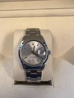 ROLEX OYSTER PERPETUAL DATE SILVER DIAL