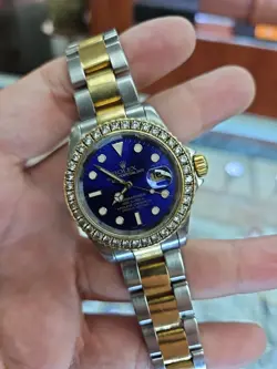 ROLEX SUBMARINER 18KT AND STEEL CUSTOM DIAMOND BEZEL AND DIAL WATCH FROM 2002