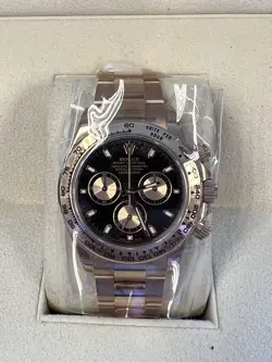 ROLEX DAYTONA MINT ROSE BLACK DIAL BOX PAPERS