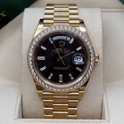 ROLEX DAY-DATE 40 BLACK BAGUETTE DIAMOND DAY DATE DIAMOND BEZEL PRESIDENTS