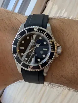ROLEX SUBMARINER 14060M WITH BLACK BEZEL