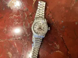 ROLEX DAY-DATE GOLD DIAMOND-SET PRESIDENT 128348RBR MOTHER OF PEARL DIAMOND
