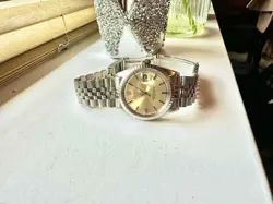 ROLEX 1603 DATEJUST STEEL 36MM CHAMPAGNE DIAL WATCH