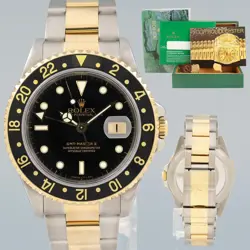 MINT ROLEX GMT-MASTER II 16713 BLACK TWO-TONE YELLOW GOLD AND STEEL OYSTER WATCH