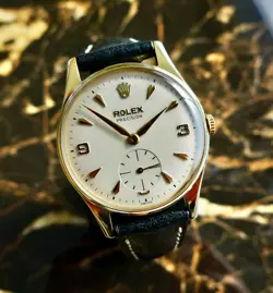 A BEAUTIFUL VINTAGE 9CT GOLD 1957 MID-SIZE ROLEX PRECISION WRISTWATCH IN 9K GOLD