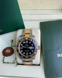 ROLEX GMT-MASTER II 116713 TWO-TONE 18K GOLD AND STEEL CERAMIC BEZEL