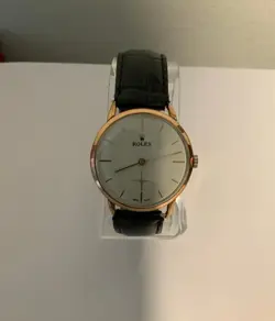 VINTAGE ROLEX WATCH WITH AN 18K GOLD PLATED CASE