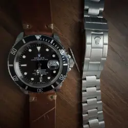 2005 ROLEX SUBMARINER 16610 SILVER OYSTER BRACELET WITH BLACK BEZEL