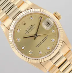 ROLEX DATEJUST 31MM 18K GOLD CHAMPAGNE DIAMOND DIAL FLUTED PRESIDENT BAND 68278