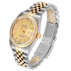 WITH CHAMPAGNE DIAL.