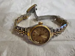 LADYIES ROLEX WATCH DARE SILVER GOLD GOOD. CONDITION