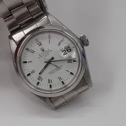 ROLEX DATE 34 MM STEEL WHITE ROMAN OYSTER AUTOMATIC WATCH 1500 CIRCA 1974