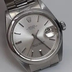 ROLEX DATE 34 MM STEEL SILVER DIAL OYSTER AUTOMATIC WATCH 1500 CIRCA 1971