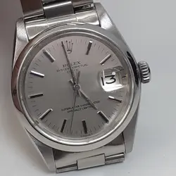 ROLEX DATE 34 MM STEEL OYSTER AUTOMATIC SILVER DIAL WATCH 1500 CIRCA 1974