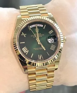 ROLEX DAY-DATE 40  GREEN OMBRé ROMAN DIAL REF.228238