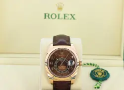 ROLEX SKY-DWELLER 18KT EVEROSE GOLD SAROS ANNUAL CALENDAR DUAL TIMEZONE