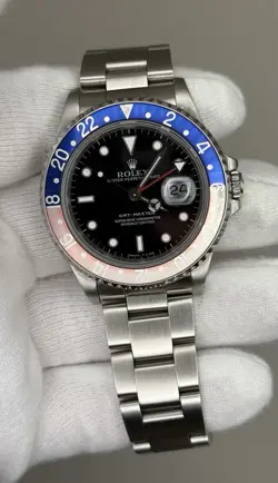 1990 ROLEX GMT-MASTER PEPSI STAINLESS STEEL WATCH REF: 16