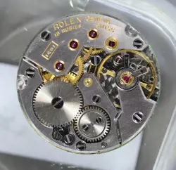 ROLEX MOVEMENT CALIBER 1601 MANUAL/MANUAL