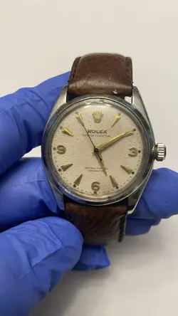 VINTAGE ROLEX OYSTER PERPETUAL 1030 25J WATCH MENS 6564 HONEYCOMB DIAL