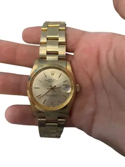 PRE-OWNED 18K GOLD ROLEX OYSTER PERPETUAL DATEJUST WATCH