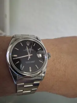 1967  ROLEX DATE 1500 OYSTER PERPETUAL SILVER RADIAL DIAL STEEL AUTOMATIC WATCH