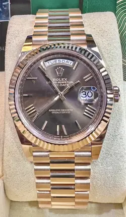 ROLEX PRESIDENT 18K ROSE CHOC DIAL DAY DATE 40 REF. 228235