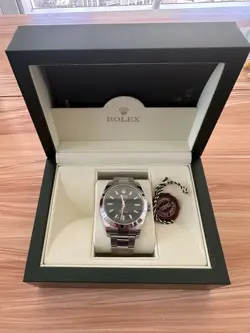 ROLEX 116400GV GREEN MILGAUSS CRYSTAL ANNIVERSARY MODEL W/BOX & BOOKS